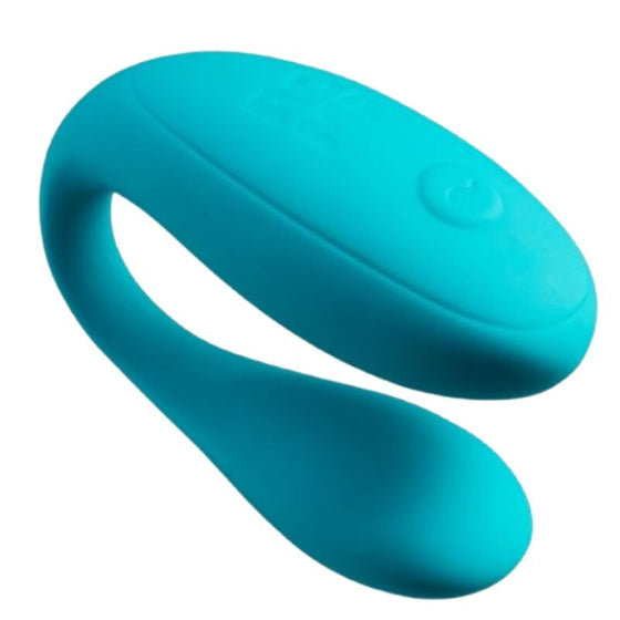 Vibromasseur pour couple ROMP turquoise en silicone, forme en U flexible et bouton de commande, pense pour une stimulation partagee pendant le rapport.