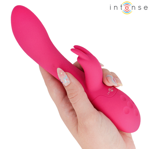Tammy rose fuchsia tenu en main, montrant la tige interne et les oreilles de stimulation clitoridienne