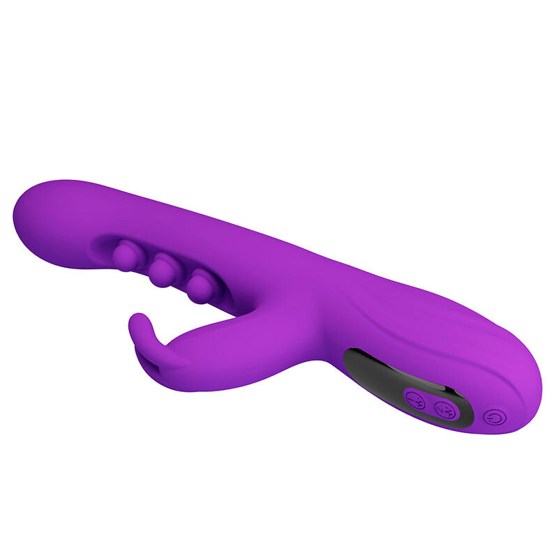 Vibrateur lapin Sabien violet allongé en diagonale, gros plan sur les trois plots de tapotement