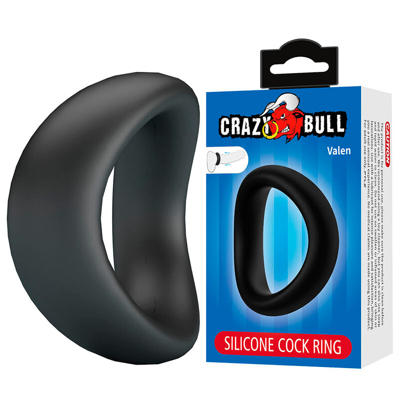 Anneau pénien incurvé Valen noir posé à côté de son emballage Crazy Bull Valen Silicone Cock Ring