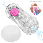Coupe de masturbation illustrant l'orifice de libération d'air à la base, médaillon montrant une main pressant la bille rose, capuchon blanc détaché
