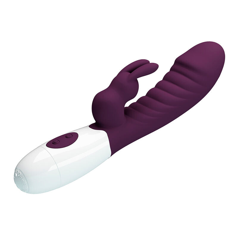 Vibrateur lapin Naughty Bunny vu en diagonale, boutons de commande visibles sur la base blanche