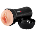 Masturbateur PDX Extreme Wet Pussies allongé, couvercle ouvert montrant l'intérieur noir