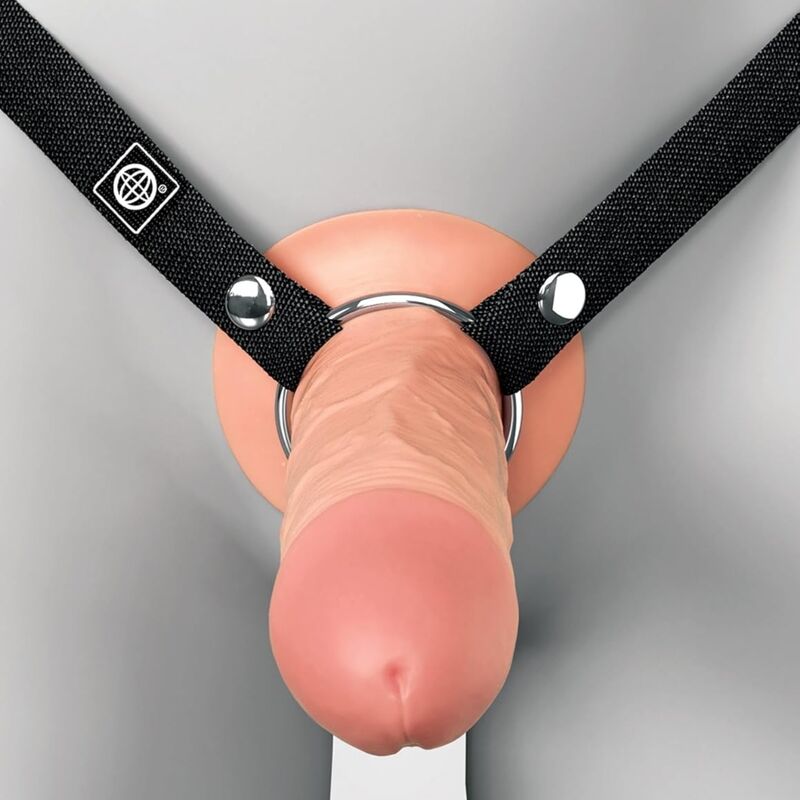 Gode creux couleur chair porté à la taille, vue de face avec logo Pipedream sur les sangles noires