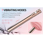 Gros plan sur l'embout arrondi du vibrateur Tia appliqué contre une surface rose, avec pictogrammes des modes de vibration