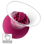 Pompe She.E.O magenta vue de dessus, montrant les picots internes et la languette centrale texturée dans la coupelle transparente