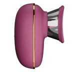 Pompe de stimulation clitoridienne rose fuchsia à liseré doré, vue de profil sur la ventouse transparente