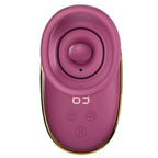 Pompe de stimulation clitoridienne rose fuchsia, vue de face sur la ventouse avec languette centrale et écran LED
