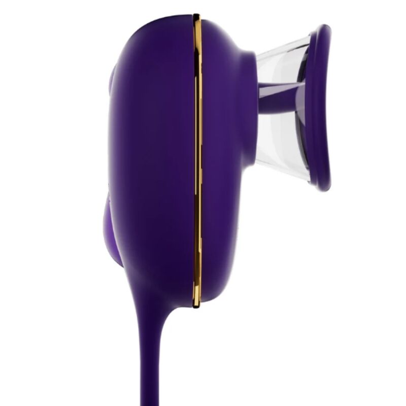 Pompe de succion clitoridienne violette, vue de profil sur le liseré doré et la ventouse transparente