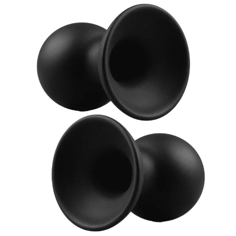 Quatre ventouses en silicone noir, gros plan sur les bases creuses en forme de coupelle