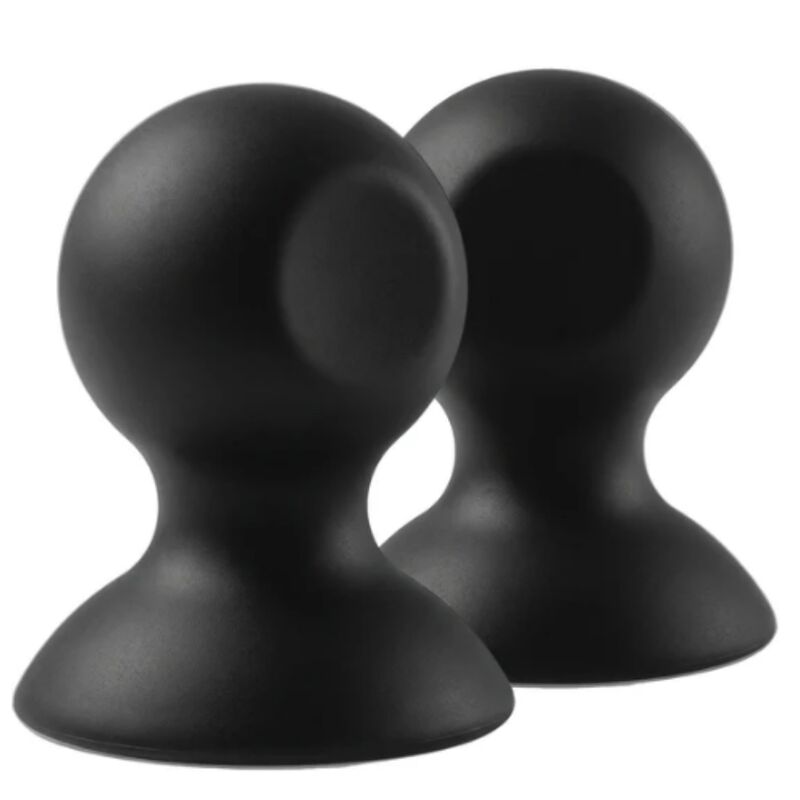 Ventouses en silicone noir, vue de trois quarts laissant apparaître la base creuse de l'une d'elles