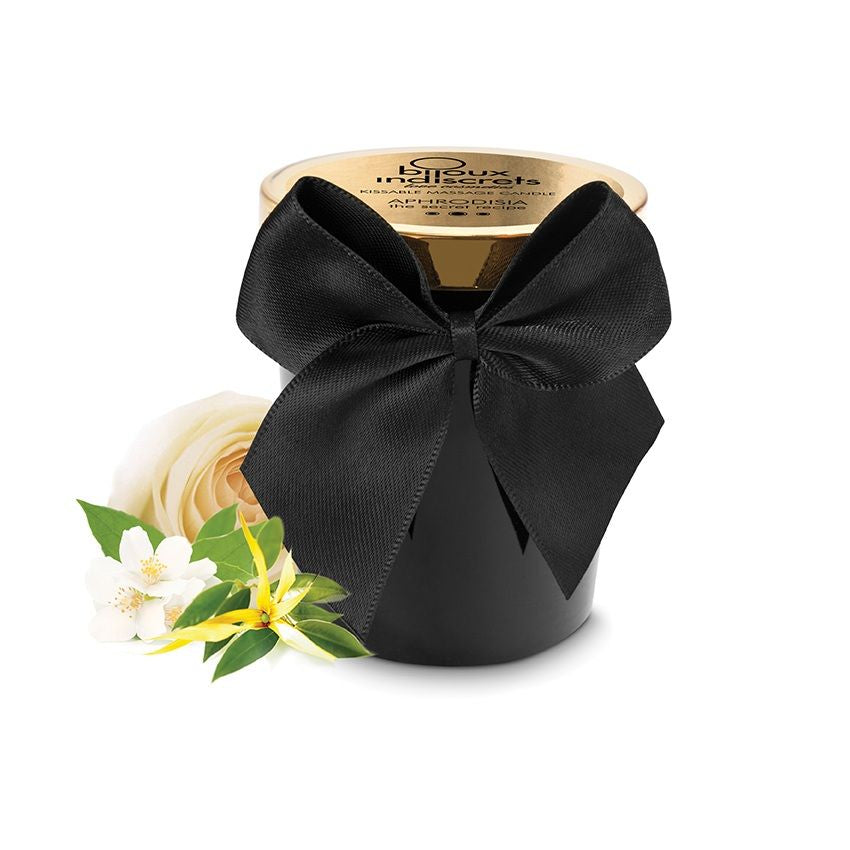 Bougie de massage Bijoux Indiscrets noeud satin noir, couvercle dore souleve et fleur de jasmin, cire parfumee orientale se muant en huile tiede pour les amants.
