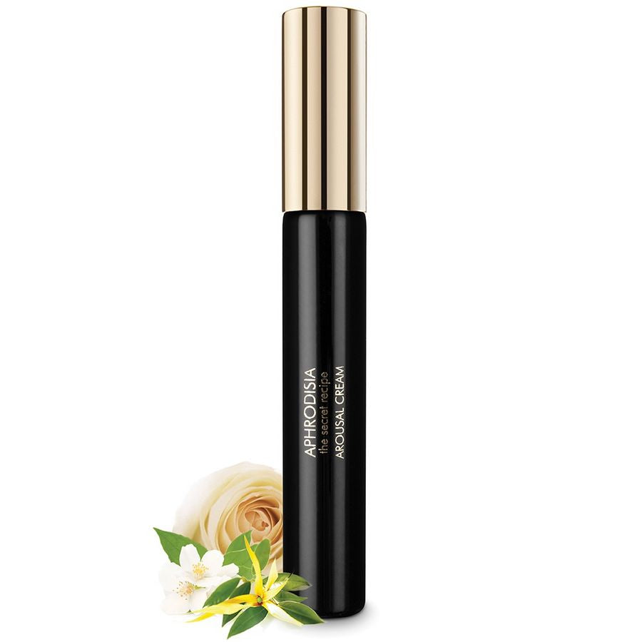 Baume clitoridien Aphrodisia Bijoux Indiscrets, flacon noir et or accompagne d'une fleur blanche, soin intensifiant feminin aux effets percus en quelques minutes.