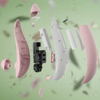 Vue éclatée du Womanizer Premium Eco rose, montrant la coque, la batterie et les composants démontables.