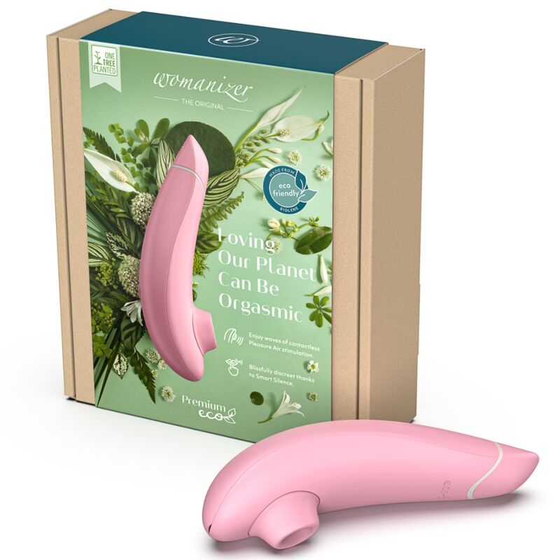 Womanizer Premium Eco rose présenté à côté de sa boîte en carton illustrée de feuillages.