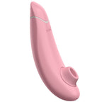 Womanizer Premium Eco rose vu de profil, embout de stimulation et contours arrondis visibles.