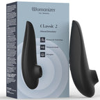 Womanizer Classic 2 Noir présenté à côté de sa boîte illustrée.