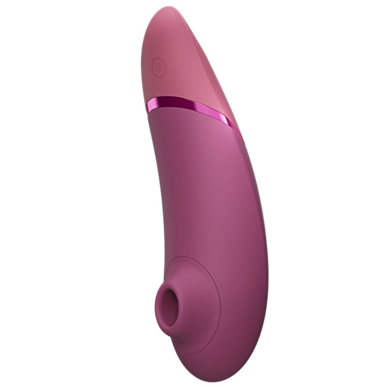 Womanizer Next Rose fondu vu de profil, avec son embout de stimulation et son liseré rose métallisé.