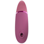 Vue de face du Womanizer Next Rose fondu, ouverture de stimulation clitoridienne visible.