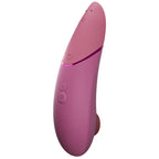 Womanizer Next Rose fondu vu de profil, avec ses commandes et son embout en silicone.