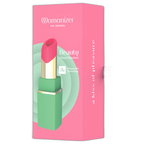 Boîte rose du Womanizer Beauty vert et rose, avec le stimulateur illustré.