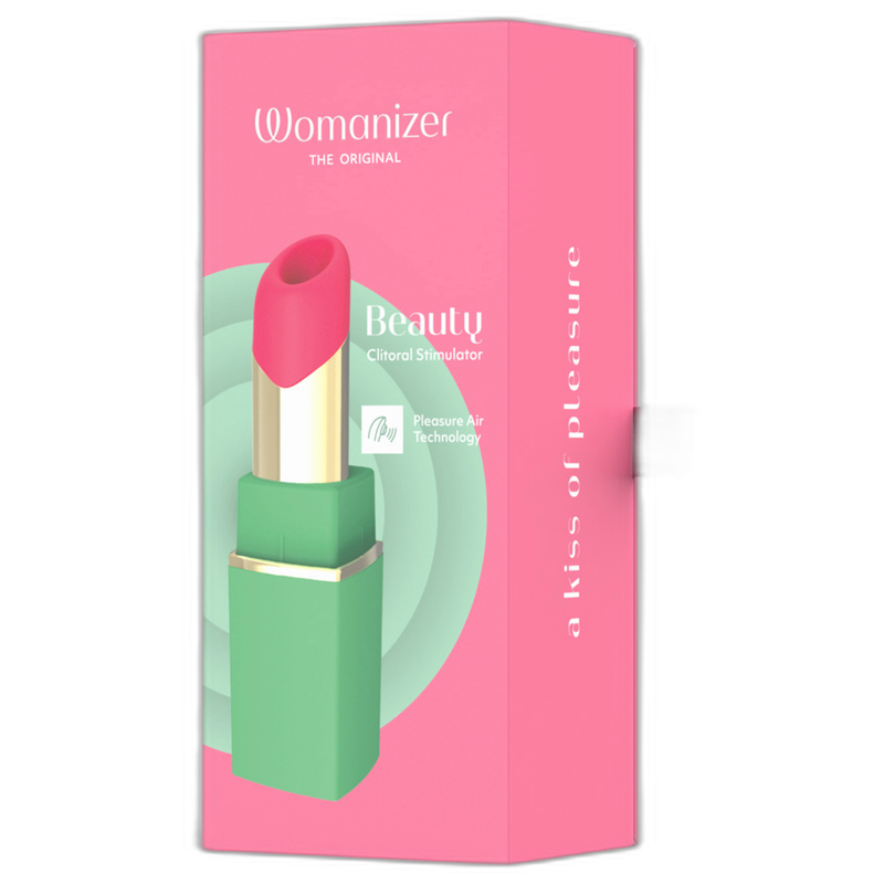 Boîte rose du Womanizer Beauty vert et rose, avec le stimulateur illustré.