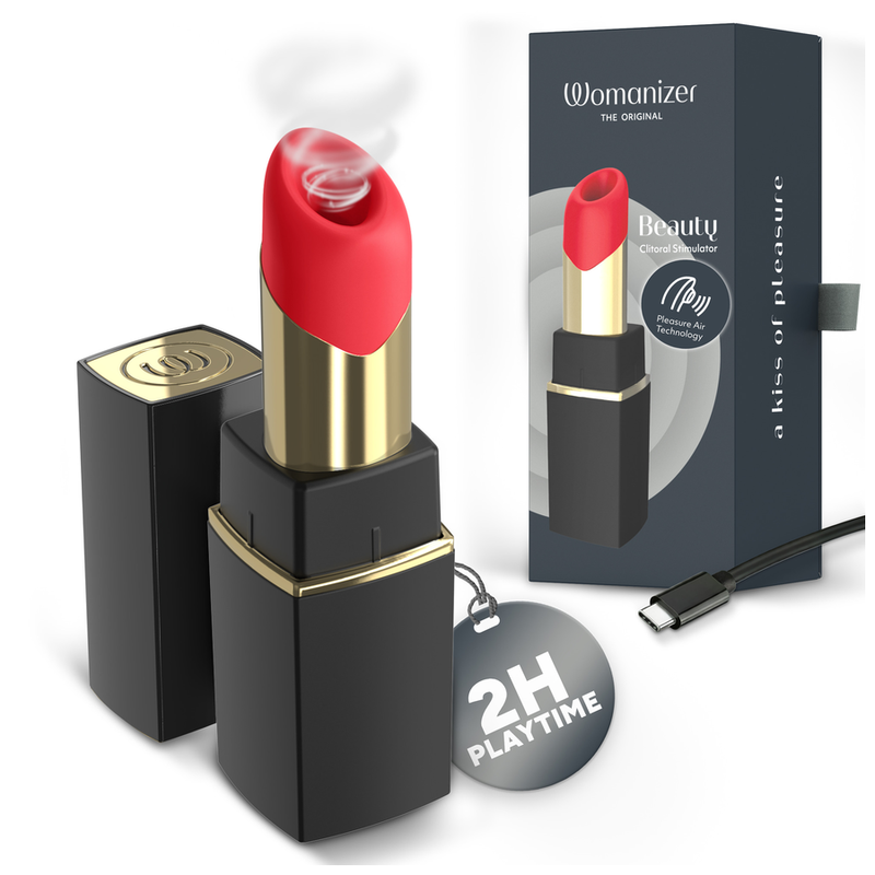 Womanizer Beauty noir et or avec embout rouge, capuchon, coffret et câble de recharge.