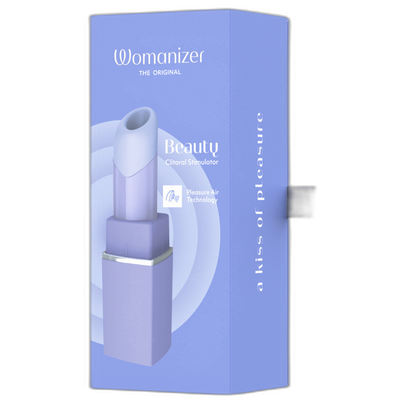 Coffret lilas du Womanizer Beauty, avec le stimulateur illustré sur la boîte.