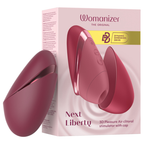Womanizer Next Liberty Bordeaux fermé, présenté à côté de sa boîte rose illustrée.