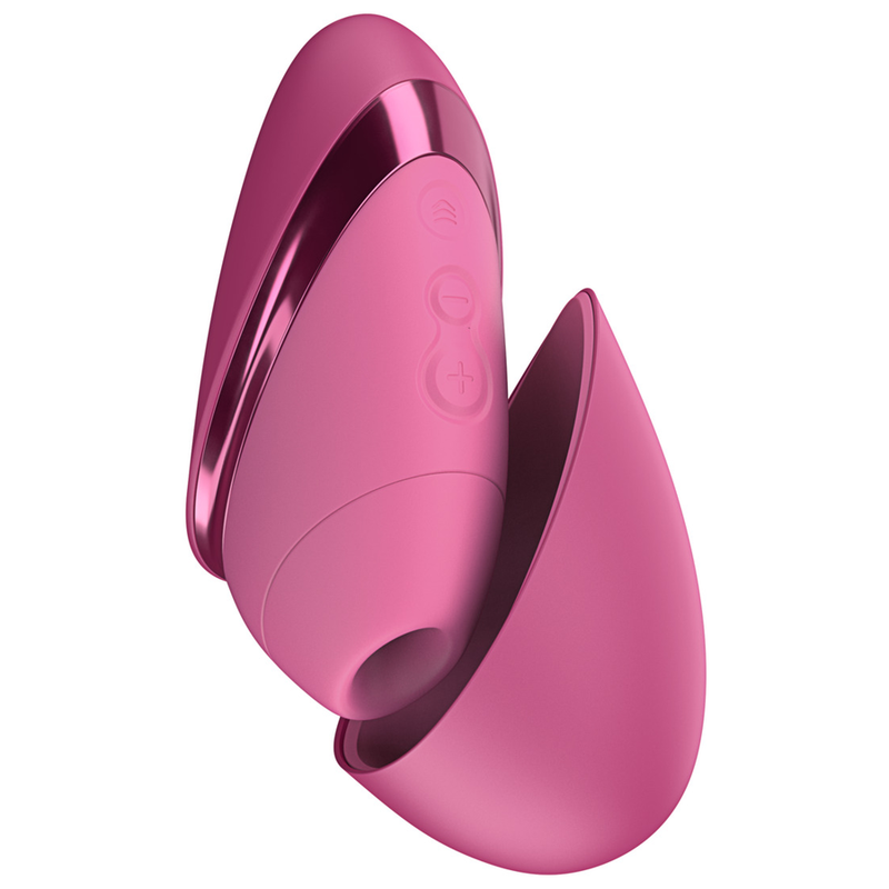 Womanizer Next Liberty Rose avec son capuchon retiré et posé à côté, embout et boutons visibles.