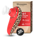 Womanizer Liberty 2 Léopard devant son coffret, avec une illustration des ondes d’air et de l’autonomie.