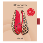Face avant de la boîte Womanizer Liberty 2 Léopard, illustrant le stimulateur rouge et son capuchon.