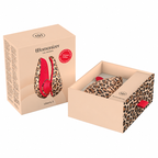 Boîte et coffret ouvert du Womanizer Liberty 2 Léopard, stimulateur à imprimé léopard rangé à l’intérieur.