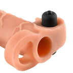 Gaine penienne vibrante Real Feel 2 vue de dessus, bullet noir loge a la base et double anneau chair, toucher realiste genereux pour vibrer des deux cotes.