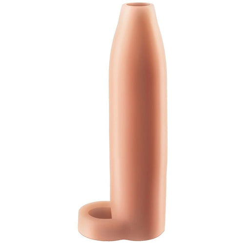 Gaine d extension penienne teinte chair a anneau testiculaire, manchon lisse au toucher peau et col d entree etroit pour rallonger le sexe en douceur.