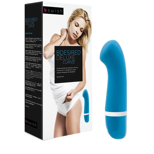 Boîte Bdesired Deluxe Curve noire à gauche montrant une silhouette enroulée d'une serviette, stimulateur bleu courbé à droite. Packaging waterproof silicone massager, produit lisse.