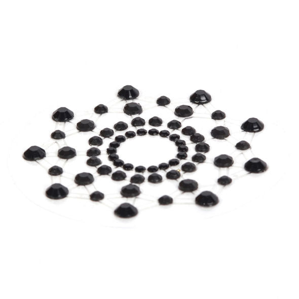 Cache-tetons bijou Mimi Bijoux Indiscrets en strass noirs montes sur fil souple, decoration corporelle adhesive metallisee brillante a poser facilement sur les tetons