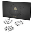 Coffret noir Flamboyant Bijoux Indiscrets avec trois pieces de bijou de corps en strass noirs et transparents, parure decorative adhesive scintillante pour le corps