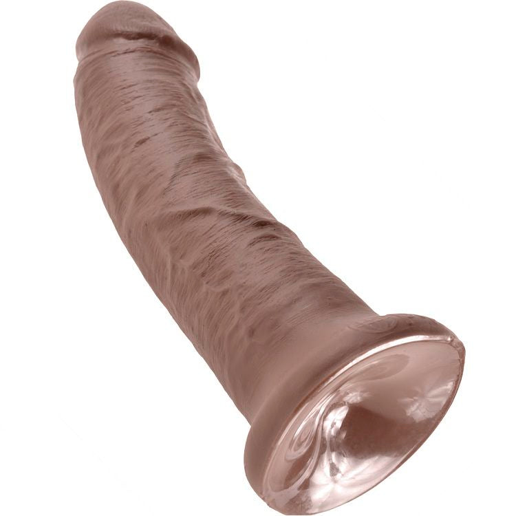 Gode realiste teinte chocolat de trois quarts, tige longue veinee et gland net, large base ventouse transparente pour un maintien mains libres stable.