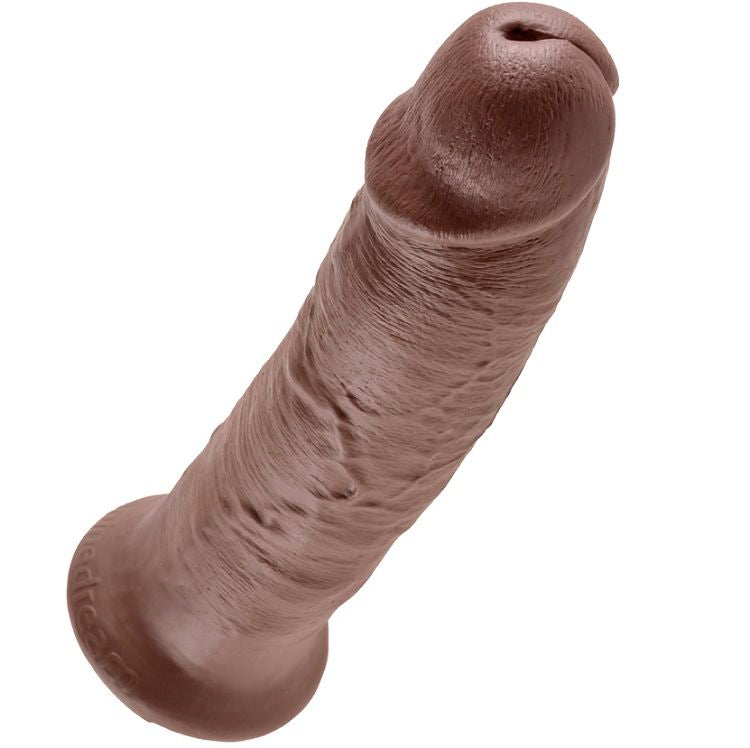 Gode realiste teinte chocolat vu de trois quarts, gland bombe et veines saillantes le long du fut, base ventouse adherente compatible harnais et solo.