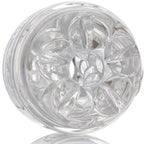 Masturbateur compact ouvert aux deux extremites, gaine transparente vue de face sur l'ouverture en etoile et la texture interne en spirale, fond blanc.
