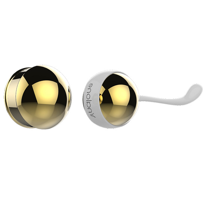 Gros plan des boules de Geisha Nalone Yany, billes métalliques dorées simple et double à surface miroir, cordon de silicone blanc. Exerciseur de Kegel pour le plancher pelvien.