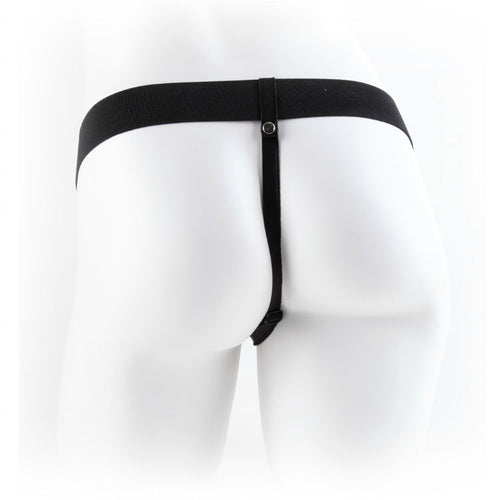 Harnais elastique noir Fetish Fantasy vu de dos sur un mannequin habille de blanc, sangles ajustables sans gode installe, support de gode-ceinture creux, accessoire seul sans anatomie.