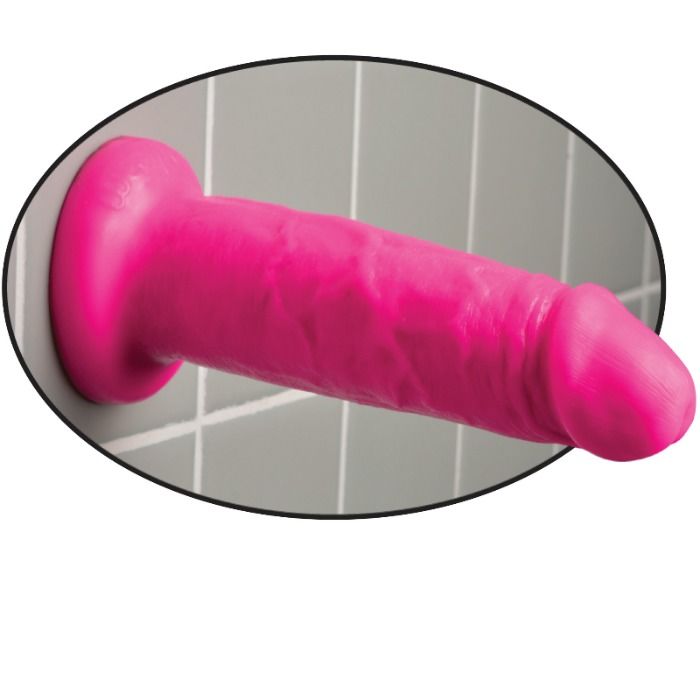 Gode realiste rose fuchsia Chub fixe par sa ventouse sur un mur carrele, vue horizontale montrant le gland et les veines, demonstration d'adherence mains libres