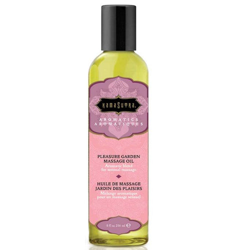 Flacon rose Kamasutra Aromatics huile de massage Pleasure Garden Jardin des Plaisirs, vue de face, notes florales rose et jasmin vegan sans sucre pour un massage sensuel.