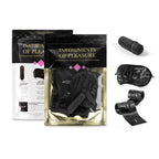 Coffret BDSM sensualité niveau initiation avec menottes et m — vue rapprochée