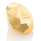 Stimulateur clitoridien Twenty One Bijoux Indiscrets, galet diamant dore vu de profil sur ses facettes brillantes, mini vibromasseur submersible et rechargeable.