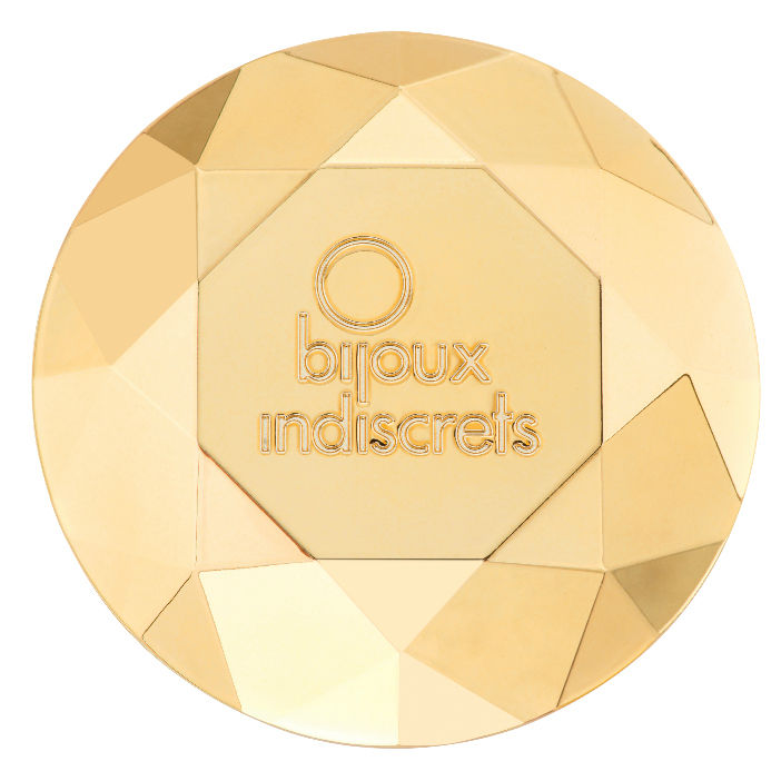 Galet vibrant Twenty One Bijoux Indiscrets en diamant dore facette grave du logo, vue de dessus, stimulateur clitoridien compact 7 modes rechargeable USB.