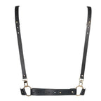 Harnais de corps femme vegan Bijoux Indiscrets en sangles noires reglables avec bretelles et mousquetons dores, vue a plat, accessoire bondage chic modulable.