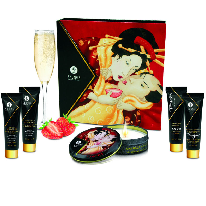 Kit Geisha Secrets Shunga fraises et cava avec sa boite illustree d un couple, coupe de champagne, fraise, bougie et tubes, cinq produits sensoriels de massage a deux